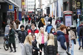 Shoppers go about their business in Belfast City Centre. Belfast City Council and a trade union have clashed on the proportion of retail workers who keen to start working on Sundays - after the council voted to trial the measure this summer.