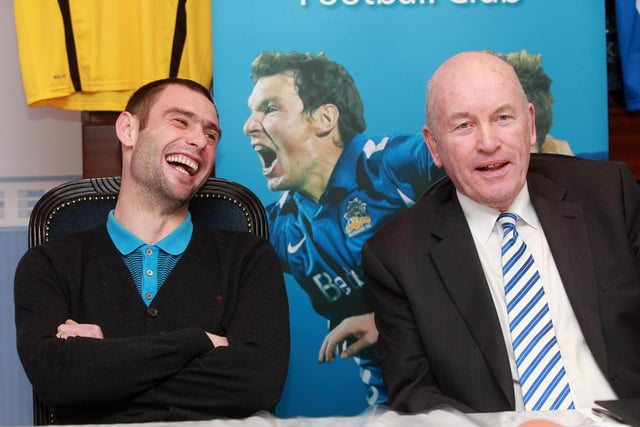 Former Northern Ireland international Gary Hamilton is all smiles during his unveiling as Glenavon boss alongside chairman Adrian Teer