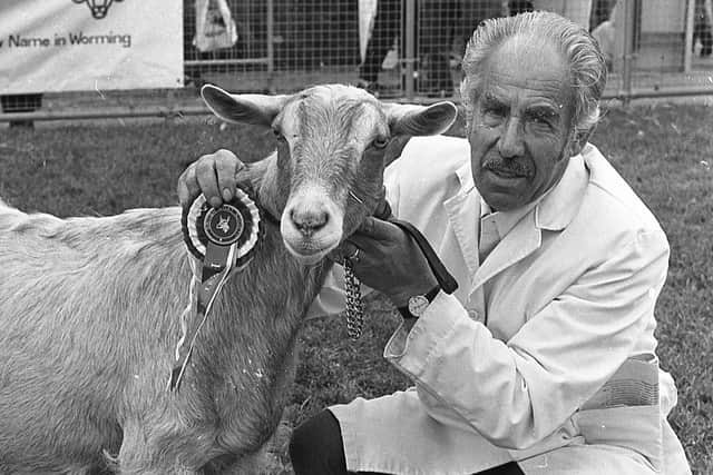 Pictured in May 1992 at the Balmoral Show is David Johnston from Kells with his supreme champion goat Gilgud. Picture: News Letter archives/Darryl Armitage