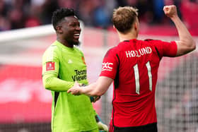 Manchester United goalkeeper Andre Onana and Rasmus Hojlund celebrate after the Emirates FA Cup semi-final win over Coventry City at Wembley Stadium. (Photo by Mike Egerton/PA Wire)