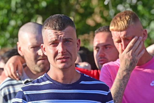 Chloe Mitchell's brother Phillip at a vigil in Ballymena. Pic: Colm Lenaghan/Pacemaker Press