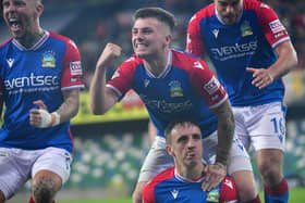 Joel Cooper enjoys the moment as Linfield team-mates celebrate his decisive goal in the Sports Direct Premiership victory over Cliftonville. (Photo by Colm Lenaghan/Pacemaker)