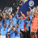 Manchester City players following Saturday's Champions League success to wrap up a trophy treble