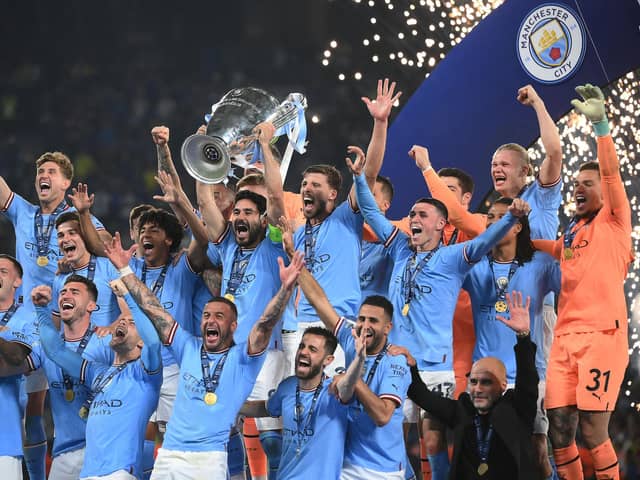 Manchester City players following Saturday's Champions League success to wrap up a trophy treble