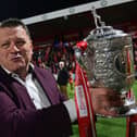Larne owner Kenny Bruce with the Gibson Cup