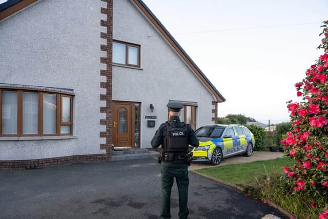 A murder investigation is under way after the death of a man in his 60s in Kilkeel on Thursday. A woman, also in her 60s, sustained serious head injuries in the incident and has been taken to hospital. A 25-year-old man has been arrested on suspicion of murder and attempted murder