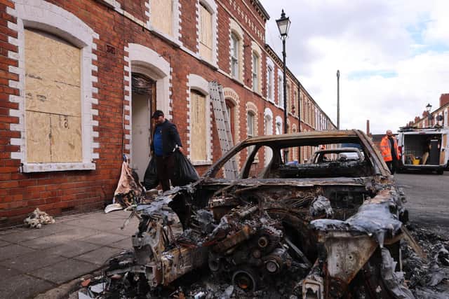 Burned out cars and boarded up houses on McMaster Street in east Belfast after violence erupted on Tuesday night on the streets following a stabbing attack in the Kinnaird Avenue residential area close to the busy Antrim Road in the city, leaving the victim with serious eye, face and back wounds