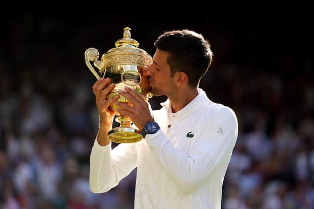 Novak Djokovic celebrates last year's Wimbledon triumph