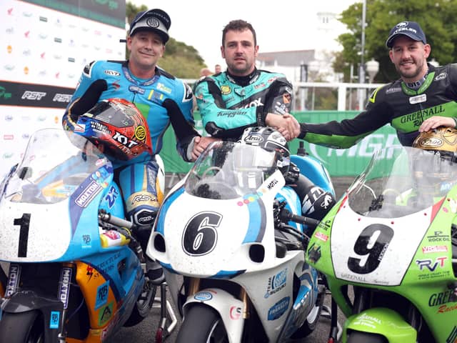 Michael Dunlop (Team Classic Suzuki) celebrates winning the RST Classic Superbike race at the Manx Grand Prix yesterday with runner-up David Johnson and third-placed Rob Hodson. Picture: Stephen Davison/Pacemaker Press