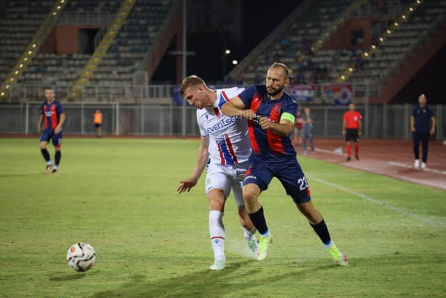 Linfield’s Ben Hall (left) working hard against Vllaznia in the Europa Conference League win. (Photo by Pacemaker)