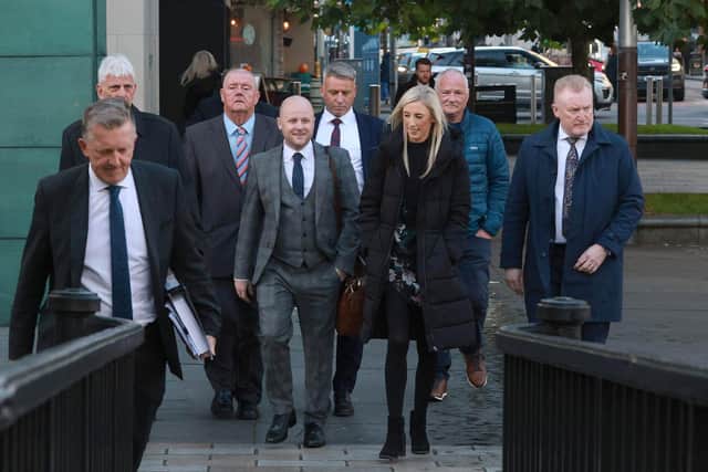 Orange Order legal representative and loyalist spokesperson Jamie Bryson (centre left) and DUP MP Carla Lockhart (centre right) Belfast High Court, where a Orange Order legal challenge is being heard after Northern Ireland Secretary Sir Chris Bryant banned the Orange Order parade in Drumcree.