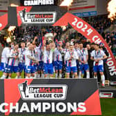 Linfield lift the BetMcLean Cup after beating Portadown. PIC: Andrew McCarroll/ Pacemaker Press