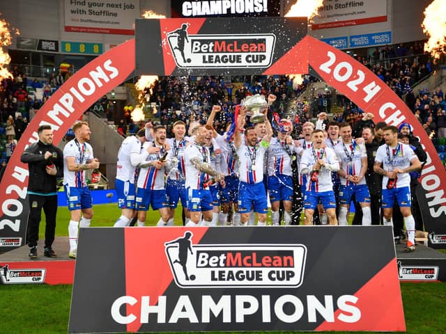 Linfield lift the BetMcLean Cup after beating Portadown. PIC: Andrew McCarroll/ Pacemaker Press