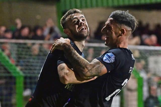 Conor McMenamin (left) and Danny Purkis celebrate during Glentoran's 4-0 victory over Larne