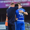 Gerardo Bruna celebrates with Dean Shiels and Tony Gorman after Dungannon Swifts avoided relegation