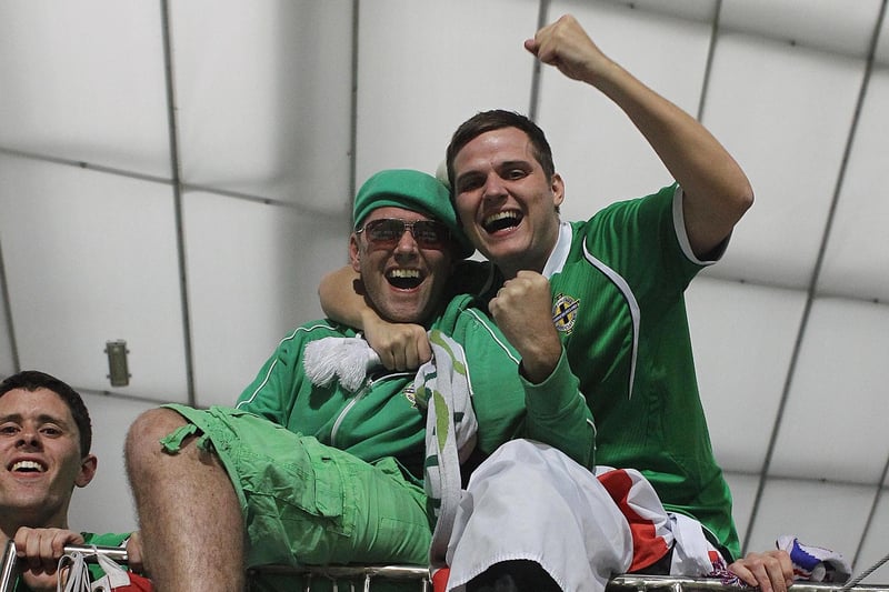 Northern Ireland fans celebrate defeating Slovenia