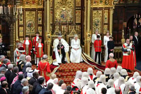 King Charles III, wearing the Imperial State Crown and the Robe of State, alongside Queen Camilla, wearing the George IV State Diadem and an embroidered gown by Fiona Clare, in the Chamber of the House of Lords during the State Opening of Parliament at the Palace of Westminster in London. His speech sets out the agenda of the government of the day (Chris Jackson/PA Wire)