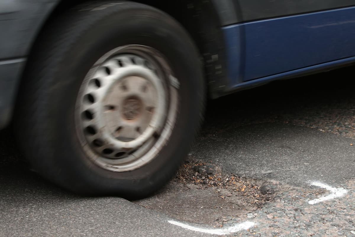 Infrastructure Minister John O'Dowd allocates an extra £1 million to help alleviate pothole problems on NI roads