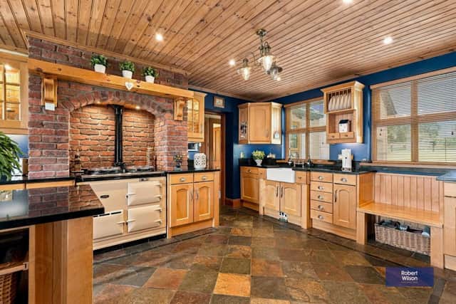 The kitchen is described as 'traditional maple' and includes an Aga cooker.