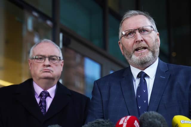 UUP leader Doug Beattie (right) speaking to the media as Steve Aiken looks on outside the Grand Central Hotel in Belfast following their meeting with Irish Foreign Affairs Minister and Tanaiste Micheal Martin