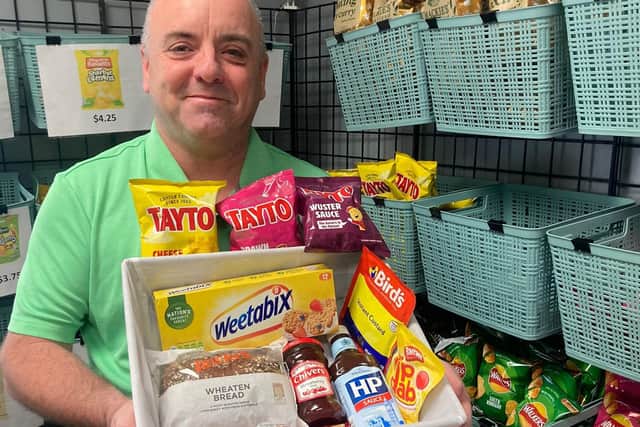 Gerard Campbell in his shop in Milwaukee that sells groceries commonly found in Northern Ireland