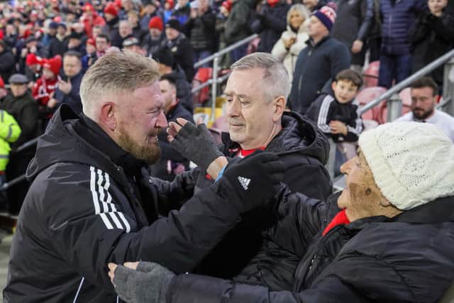 Niall Currie as Portadown boss embracing his mother, Lily, after a big win at Shamrock Park. (Photo by David Maginnis/Pacemaker Press)