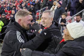 Niall Currie as Portadown boss embracing his mother, Lily, after a big win at Shamrock Park. (Photo by David Maginnis/Pacemaker Press)