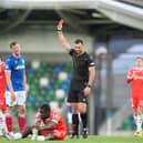 Linfield's Ben Hall is shown a red card by referee Andrew Madley during the Champions League exit to Shelbourne at Windsor Park. (Photo by Niall Carson/PA Wire)