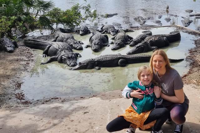 Kirsty and her daughter Jessica with the alligators.