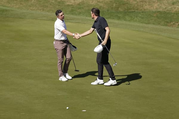 Northern Ireland's Rory McIlroy (left) and Keegan Bradley shake hands on the 16th green after their match at the World Golf Championships-Dell Technologies Match Play