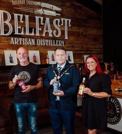 Ian Perry (distiller at Belfast Artisan Gin), Mayor of Antrim and Newtownabbey, Cllr Mark Cooper and Jo Davison (Director of Belfast Artisan Gin).