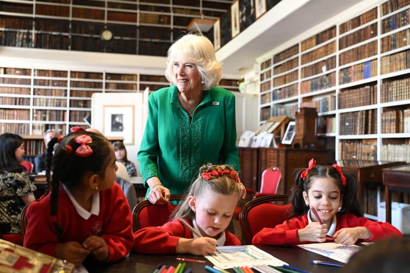 Queen Camilla during a visit to Robinson Library, Armagh, Co Armagh, to continue her work to foster a love of reading across all ages as part of a two day visit to Northern Ireland. Picture date: Thursday May 25, 2023. PA Photo. See PA story ROYAL Ulster. Photo credit should read: Michael Cooper/PA Wire