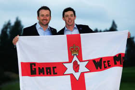 Northern Ireland's Graeme McDowell and Rory McIlroy enjoying Team Europe success. (Photo by Jamie Squire/Getty Images)