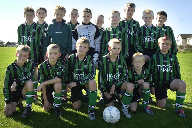 Blackpool and District Youth Football league match between Our Lady (green and black) and Wyre Villa U11s, at Blackpool Road North St Annes, 2003. Our Lady team, front row L-R: Kynan Dawes, Matthew Grindley, Robert Clough, Michael Cox, Tom Carr and Jack Todd. Back: David Palmer, Richard Ingham, Ben Perkins, Ben Willis, Thomas Glover, Sam Whittle, Joseph Whittle, Ben Shields, Alasdair Pollock and Evan Taylor.