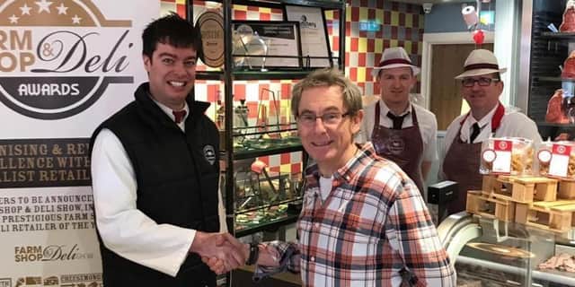 James Cunningham of Cunningham’s in Kilkeel, overall winner in 2023. James was pictured with chief judge Nigel Barden