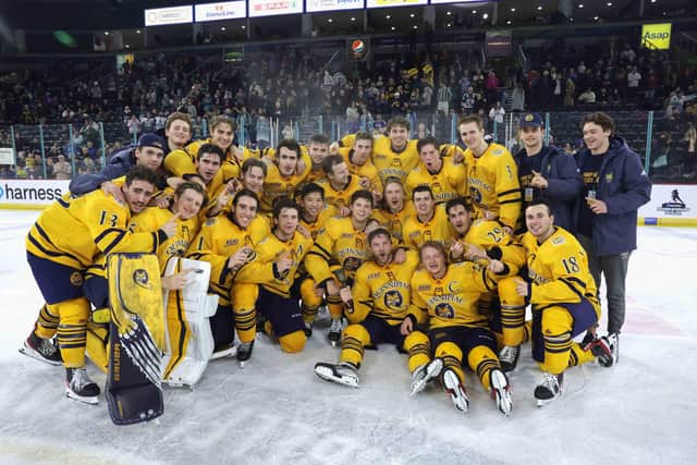 Quinnipac Bobcats celebrate after winning the coveted Belpot Trophy after defeating Massachusetts Minutemen in Saturday’s Friendship Four Final at The SSE Arena, Belfast.