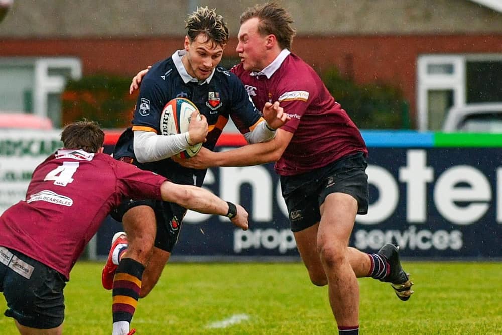 Banbridge’s Ben Johnston tackled by Chris Balfour against Enniskillen. (Photo by Andrew McCarroll/Pacemaker Press)