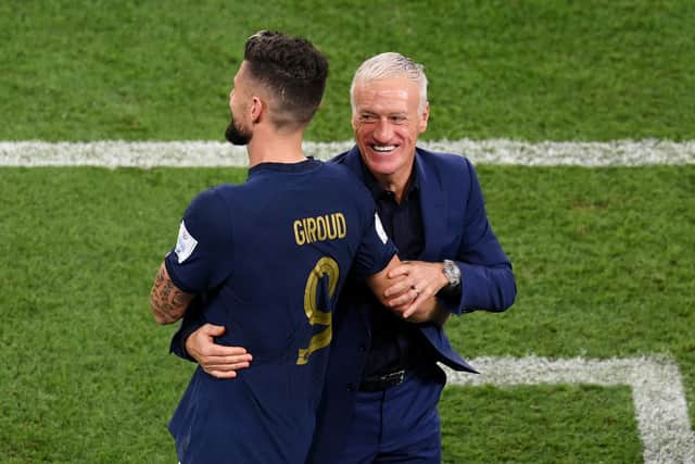 France manager Didier Deschamps with Olivier Giroud during Tuesday's 4-1 victory over Australia in the World Cup. (Photo by Stu Forster/Getty Images)