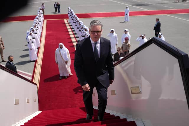 Prime Minister Sir Keir Starmer boards a plane at the airport in Doha, Qatar, today, following his visit to the Gulf region (Alastair Grant/PA Wire)
