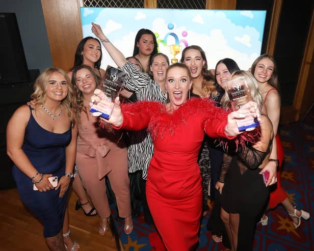 Staff celebrate after Puddleducks, a Belfast city centre day nursery provider, clinches the top award in their field at the Families First Spring Early Years Awards