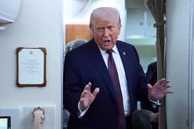 President Trump aboard Air Force One from Davos o Washington. Many unionists in Northern Ireland, like others on the right of British politics, have a sneaking regard for the president (AP Photo/Evan Vucci)