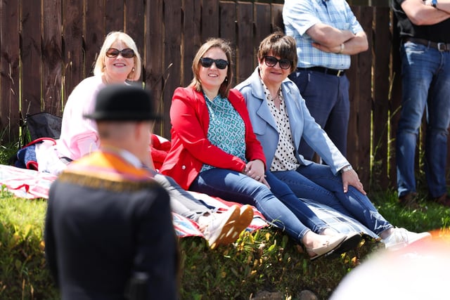Former First Minster Dame Arlene Foster, right, and Deborah Erskine MLA watch as Orangemen and supporters take part in the annual Rossnowlagh procession, in Donegal