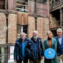 Geoff Sloan (Hearth Committee Member), Marcus Patton, (Vice Chair of Hearth), Mari McKee (Heritage Development Officer, Hearth), Paul Mullan (Director for Northern Ireland at The National Lottery Heritage Fund), Rita Harkin (Hearth Committee Member) in the central atrium of Riddel'sWarehouse.