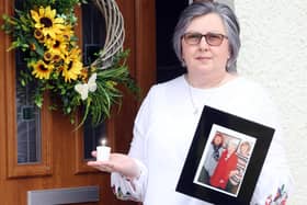 Brenda Doherty with a picture of her mother Ruth, who was the first female victim of Covid-19 in Northern Ireland