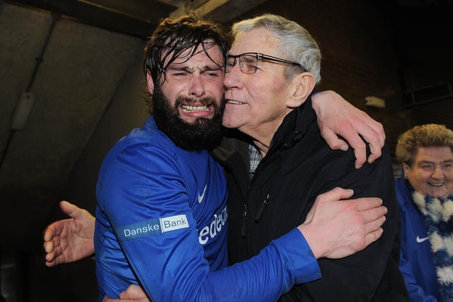 An emotional Gary Hamilton celebrates reaching a first Irish Cup final as manager with his grandfather after they defeated Crusaders 3-1. After the score was tied 1-1 following normal time, Ciaran Martyn and Mark Patton scored in extra-time to book Glenavon's spot in the decider
