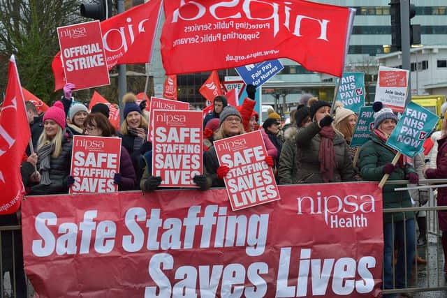 Nurses from the NIPSA union strike at Altnagelvin Hospital during previous industrial action in the winter of 2019. DER5119GS - 003