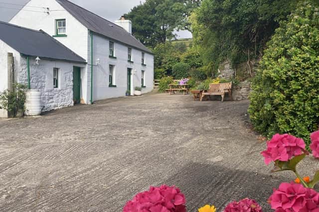 Glenann Cottage is a beautifully restored, dog-friendly traditional whitewashed farmhouse in Co Antrim