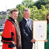 Keith and Kristyn Getty are pictured with Mayor of Lisburn & Castlereagh City Council, Councillor Scott Carson and Chief Executive, David Burns with the Freedom of the city scroll presented to them today.
Photo by Press Eye.
