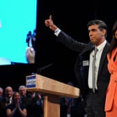 Prime Minister Rishi Sunak with his wife Akshata Murty on stage at the end of his keynote speech during the Conservative Party annual conference at the Manchester Central convention complex.  Photo: Peter Byrne/PA Wire