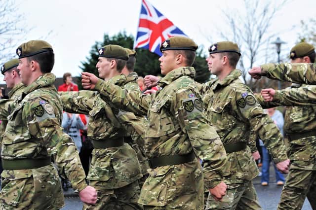 A welcome home parade in Castlereagh for the Irish Guards in 2011 after their tour of Afghanistan. Photo: Colm Lenaghan/Pacemaker